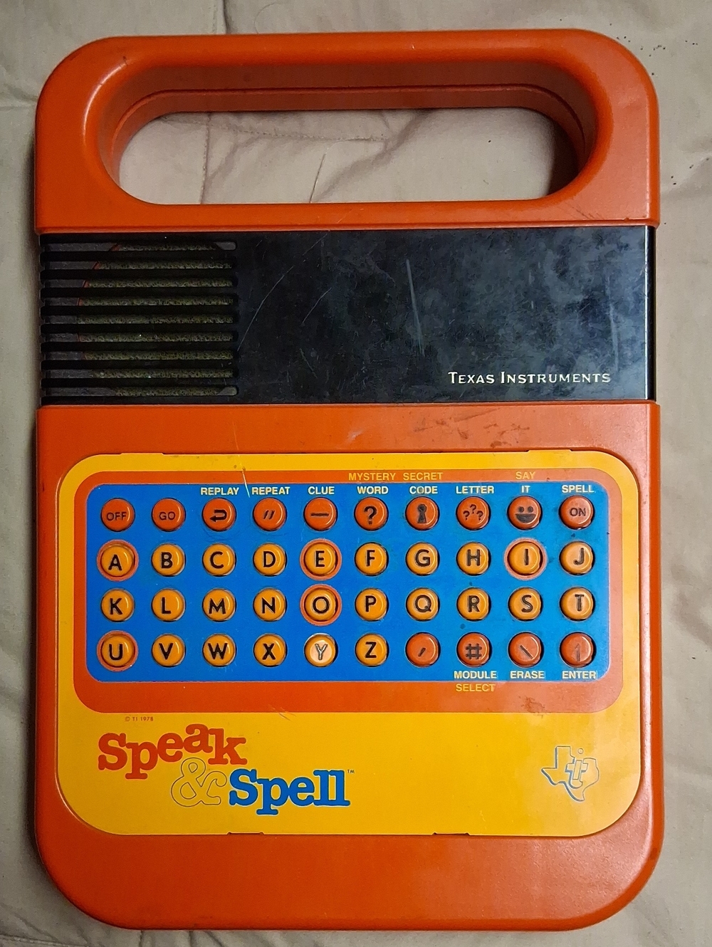 Texas Instruments Orange and Yellow Speak & Spell Handheld Learning Console